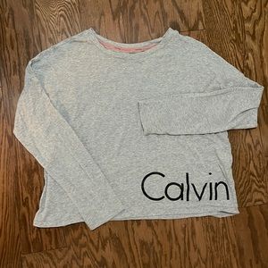 Calvin Klein Performance long sleeve cropped light gray top. Size Large.